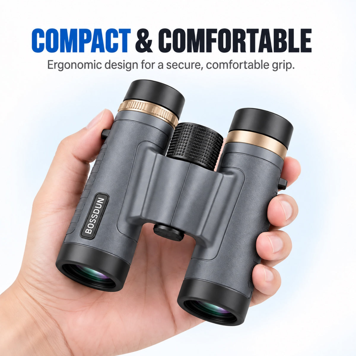 Compact grey binoculars held comfortably in one hand 